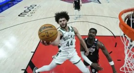 NBA选秀大会状元弗拉格加盟波特兰开拓者，传承32号球衣荣耀